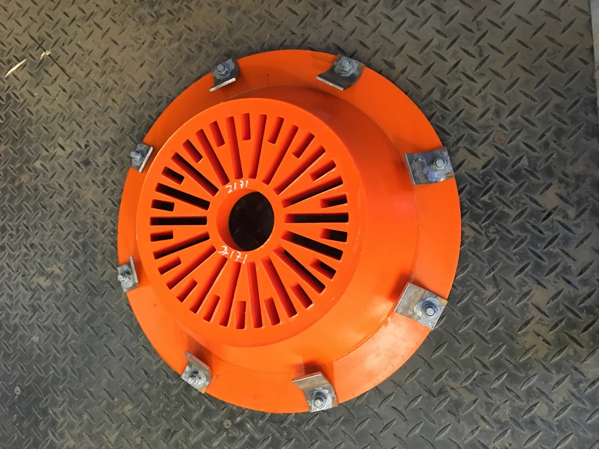 A moulded polyurethane cover plate with a slotted centre and steel fixing clamps