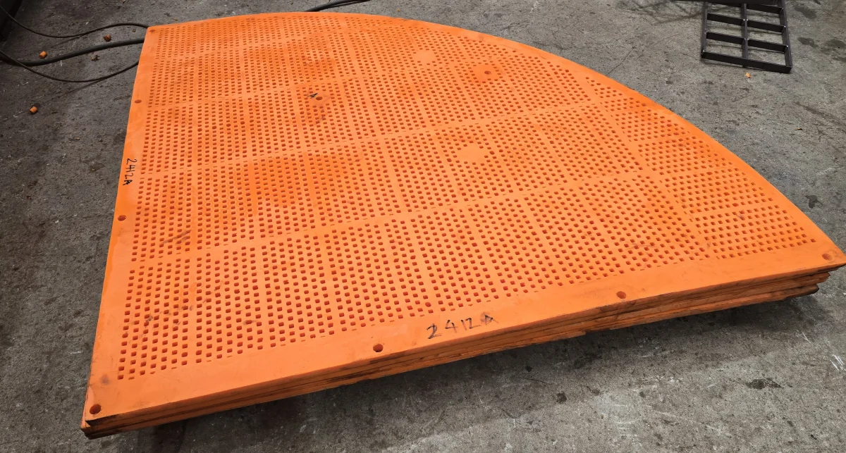 A large curved OXY-PRO® trommel screen panel with square tapered apertures